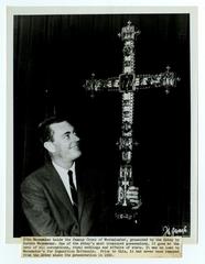 Photograph of John Wanamaker holding the cross of Westminster