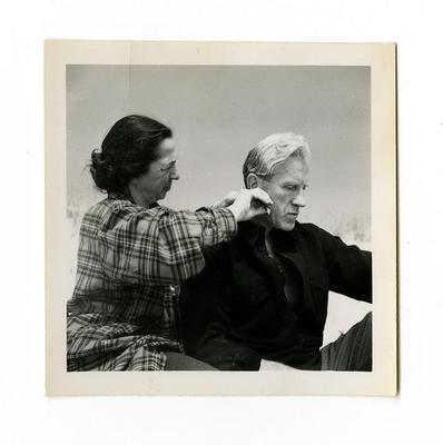 Ellen Sahlin Hartshorne cutting Richard Hartshorne's hair photograph