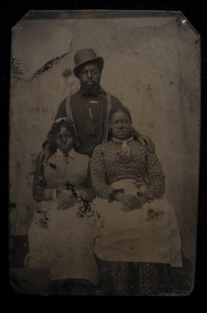 Full-length tintype portrait of an African-American family, 1861