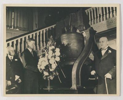 Albert M. Greenfield, Charles Lindbergh, and unidentified man in front of the Liberty Bell photograph, undated