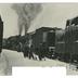 Reading Railroad rail cars and workers in snow photograph, 1943