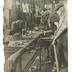 J. G. Brill Company plant interior showing two workers with power drill, photograph
