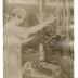 J. G. Brill Company plant interior with woman working machinery, photograph