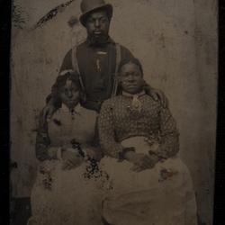 Full-length tintype portrait of an African-American family, 1861